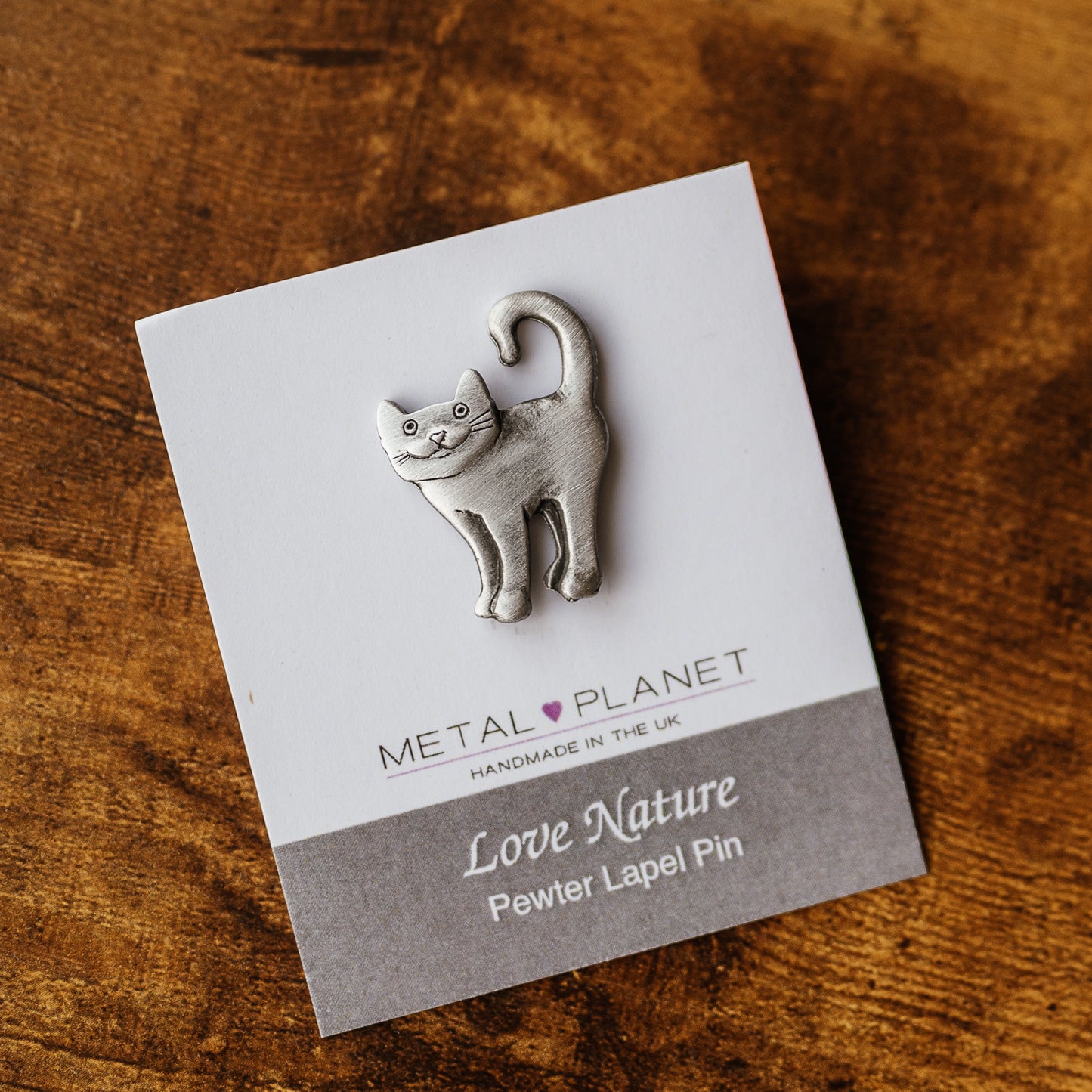 Cat curled tail jacket pin