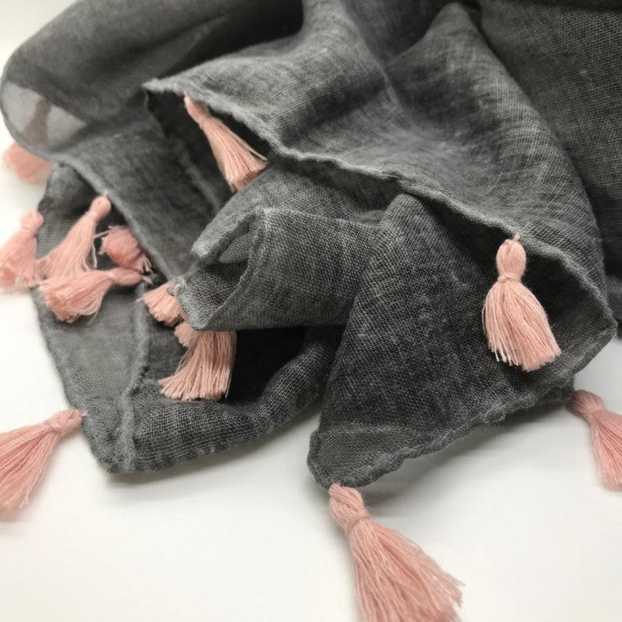 Soft grey woven scarf with pastel pink tassles
