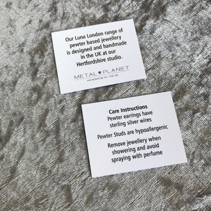 Sparkly stud earrings by Luna London