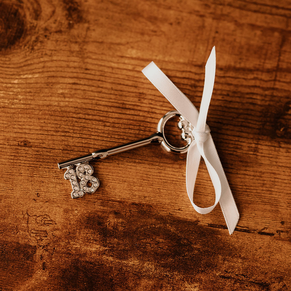 A personalised shiny '18' metal key for an 18th Birthday celebration!