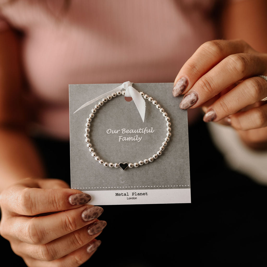 Our Beautiful Family - Tree of Life / Polished silver heart bead stretch bracelet