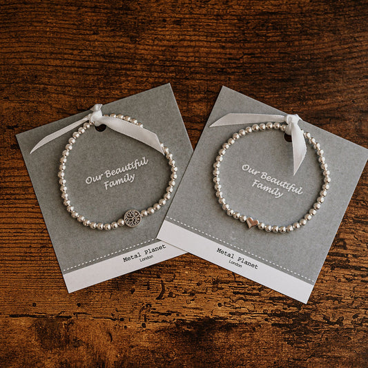 Our Beautiful Family - Tree of Life / Polished silver heart bead stretch bracelet