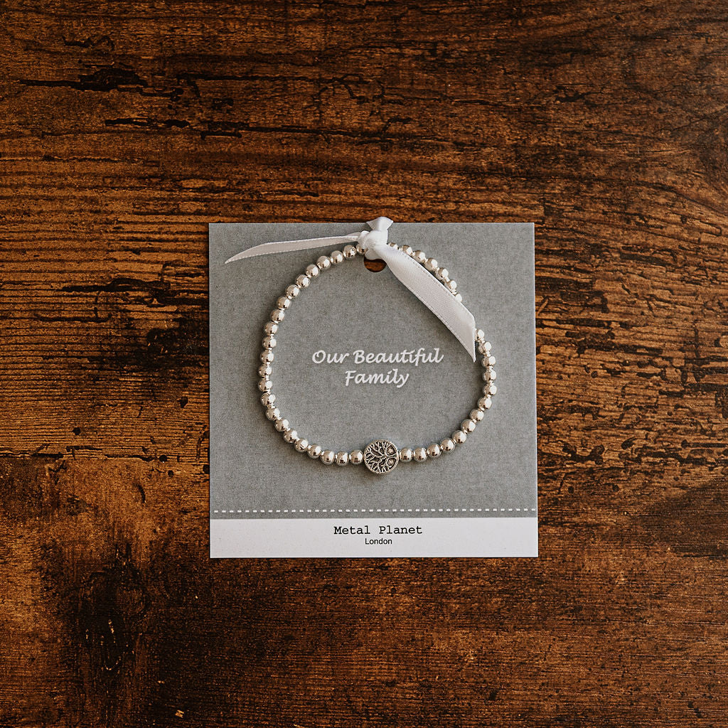 Our Beautiful Family - Tree of Life / Polished silver heart bead stretch bracelet