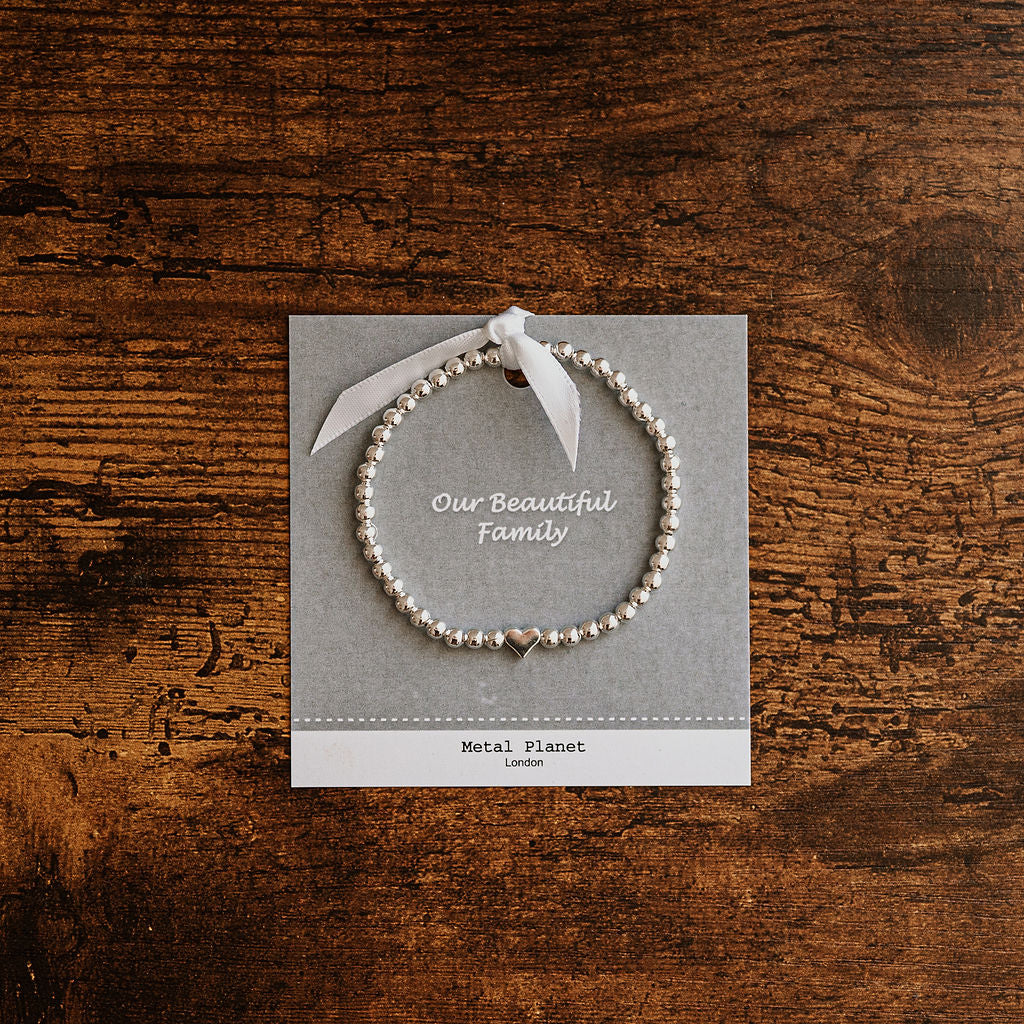 Our Beautiful Family - Tree of Life / Polished silver heart bead stretch bracelet