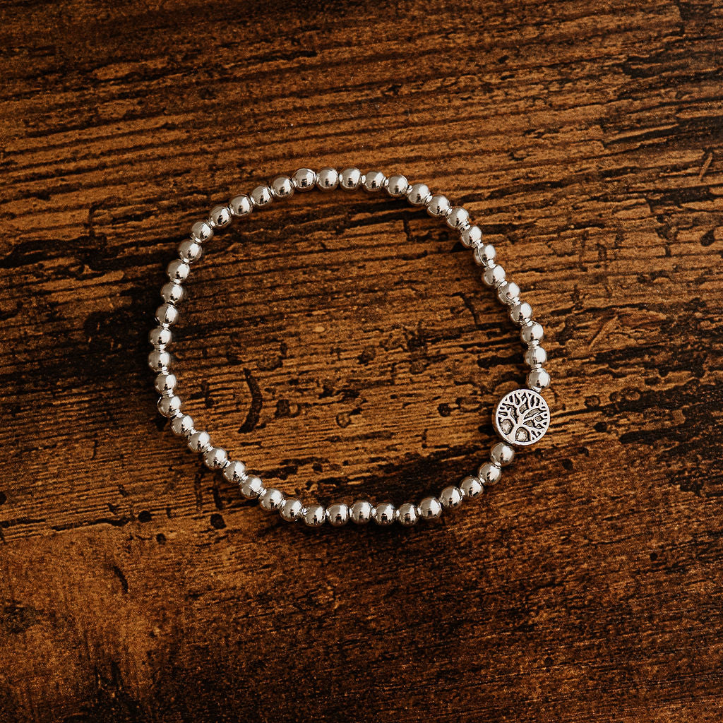 Our Beautiful Family - Tree of Life / Polished silver heart bead stretch bracelet