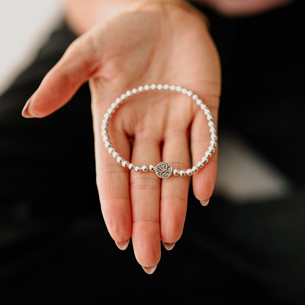 Our Beautiful Family - Tree of Life / Polished silver heart bead stretch bracelet